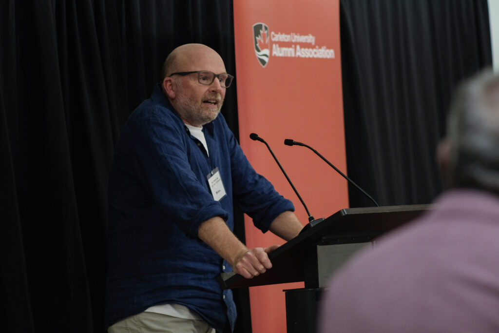 Speaker at the podium during the economics alumni reception