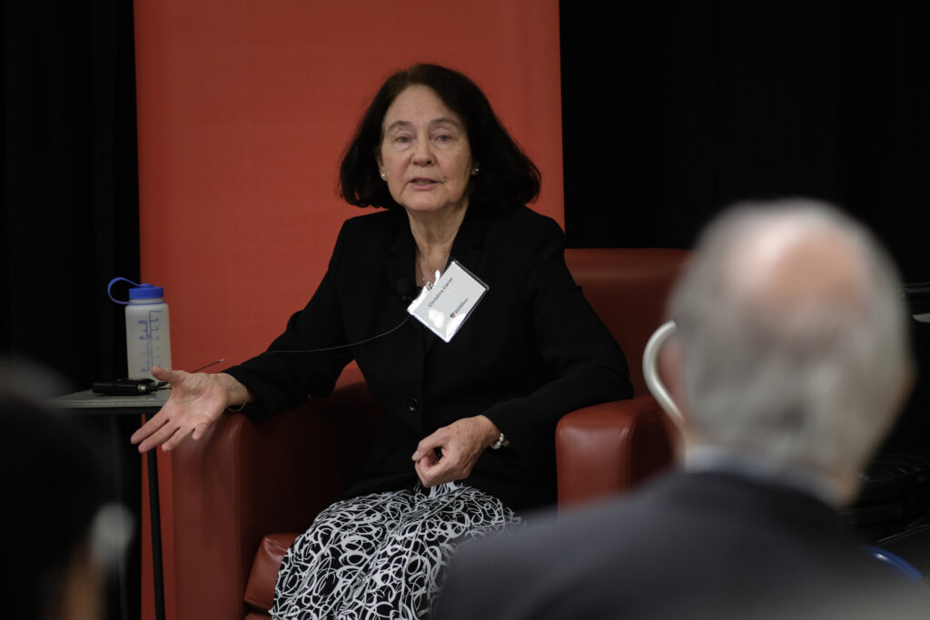 Christina Caron speaking at the economics alumni reception