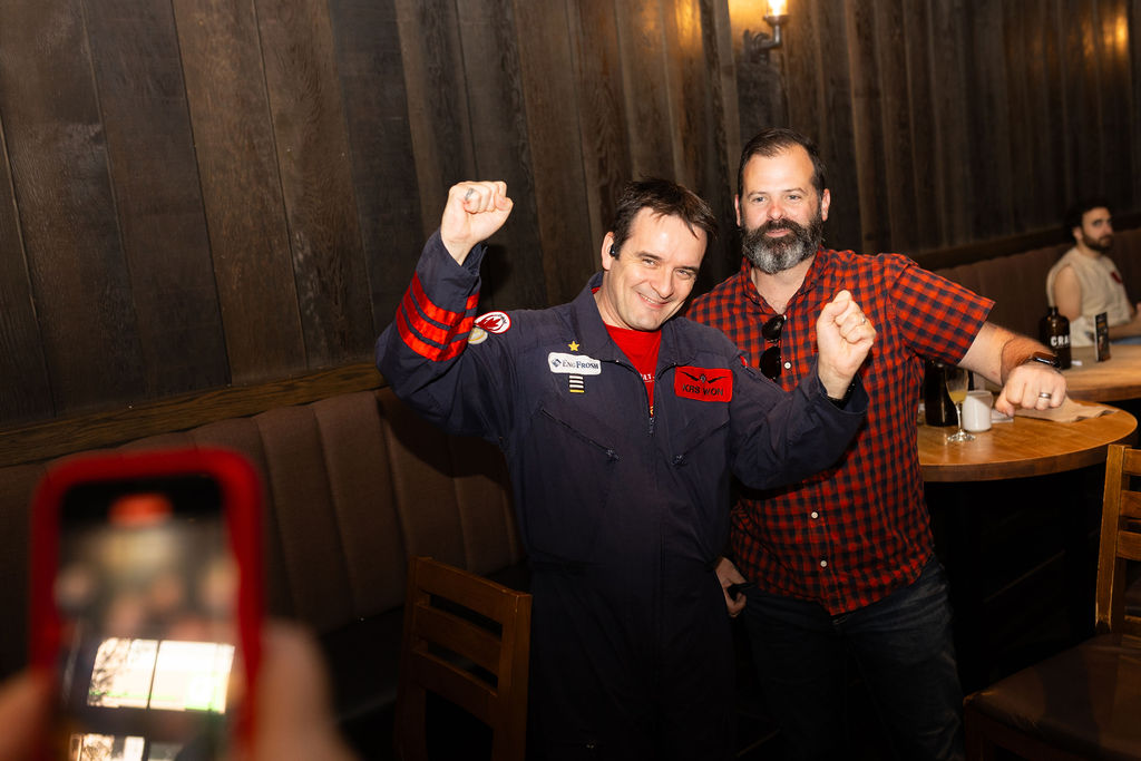 Two people pose for a photo