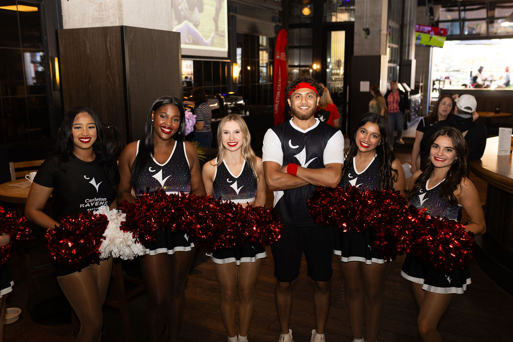 Ravens Rhythm pose for a photo