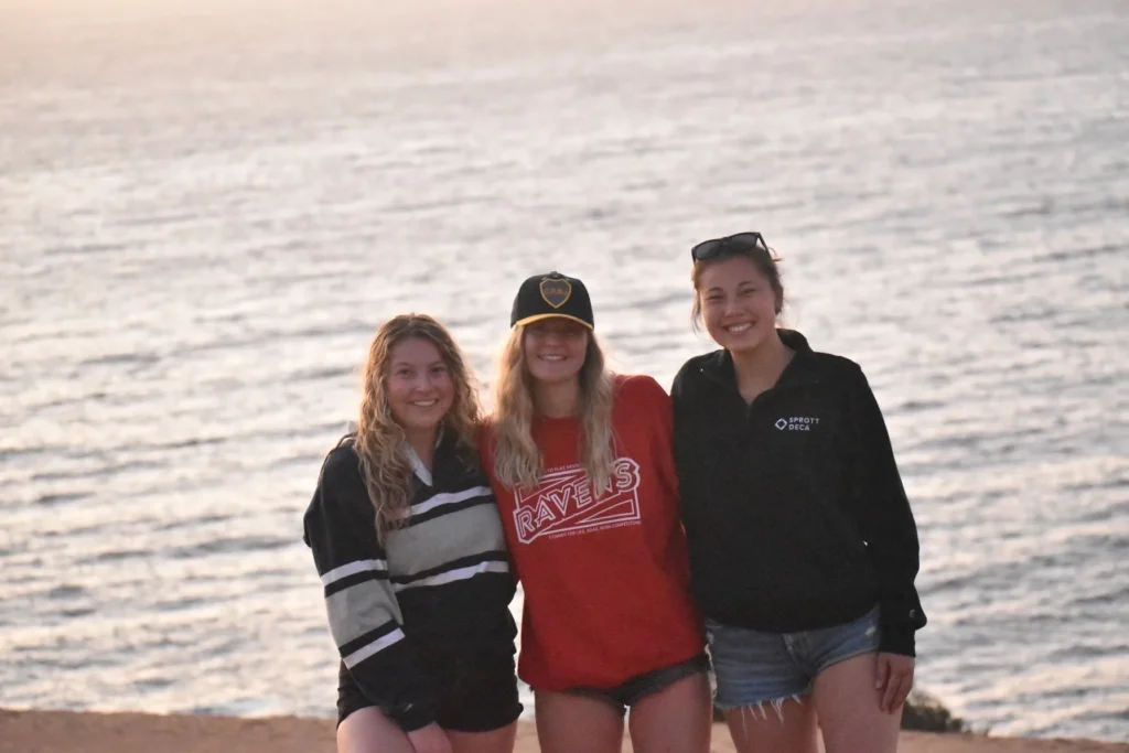 Photo of Megan with two friends during her exchange