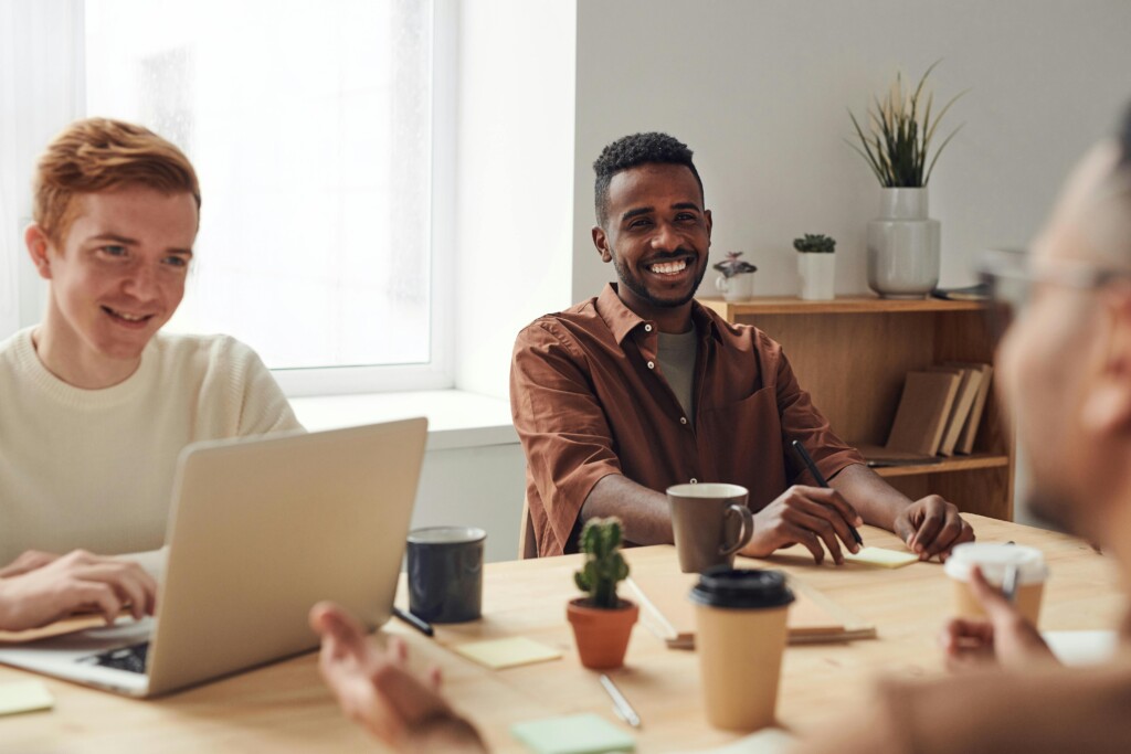 Young professional smiling in a meeting