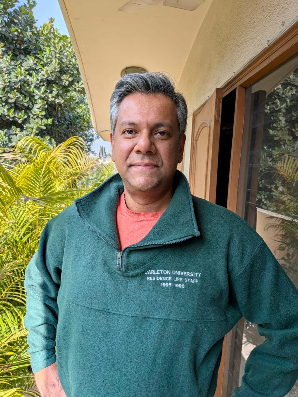 Vishnu Som wearing his Carleton University Residence Life 1995-1996 sweater