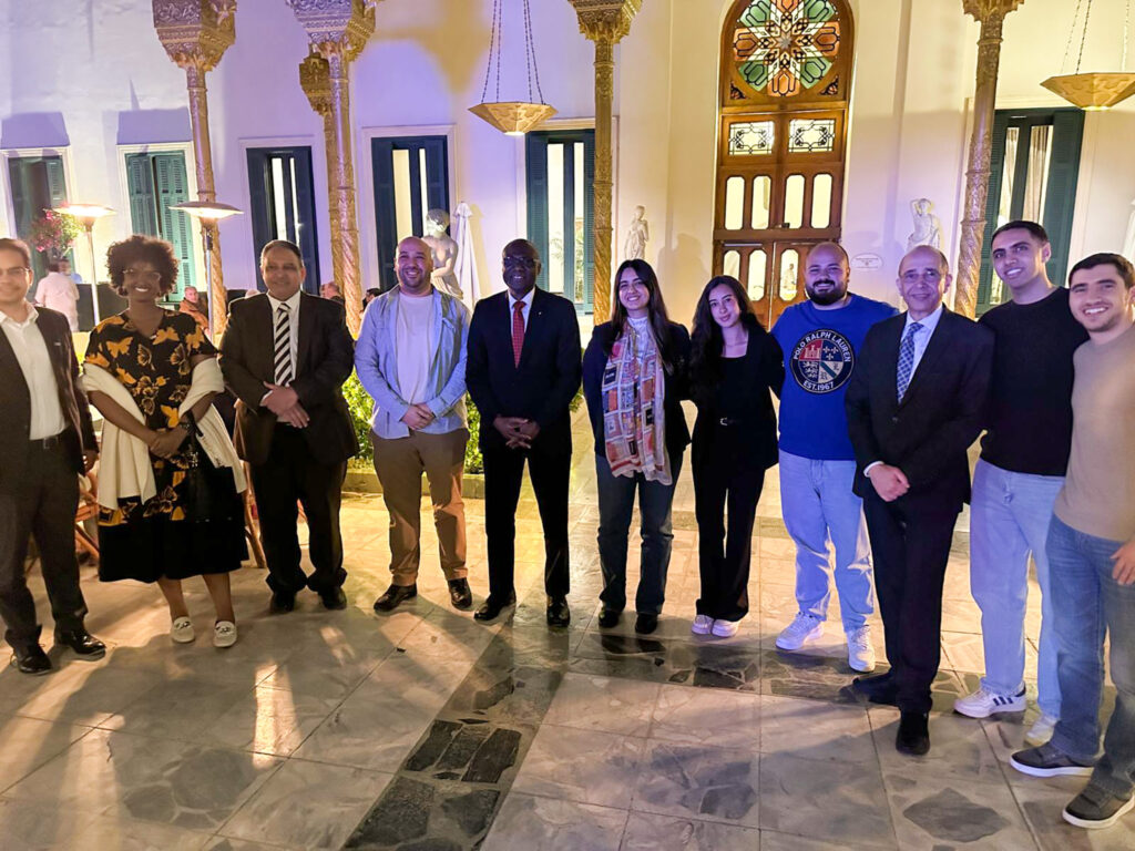 Attendees pose for a group photo at the Carleton University reception in Cairo, Egypt.