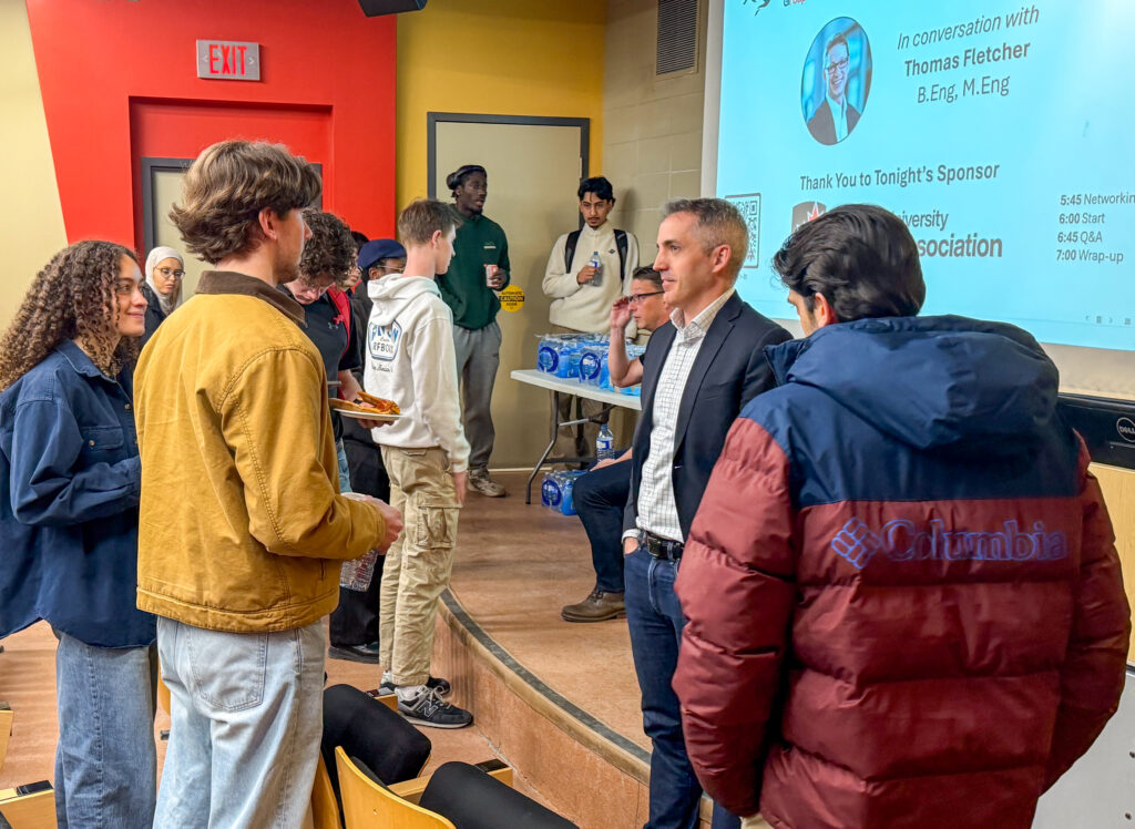 William Jones (second from the right), chats with students at the Carleton Engineering Entrepreneurship Group's first event.