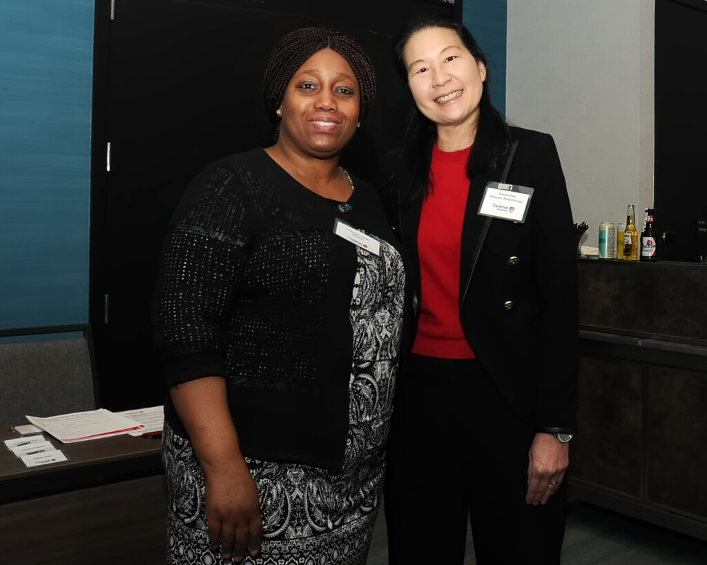 a photo of two women smiling. 