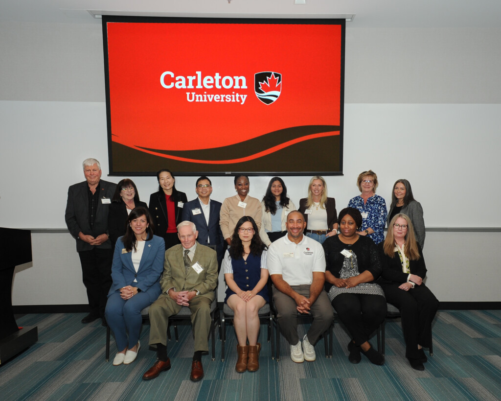 group photo of Carleton alumni sitting in two rows.