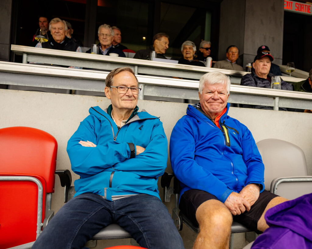 Two people smile for a photo at the Panda Game