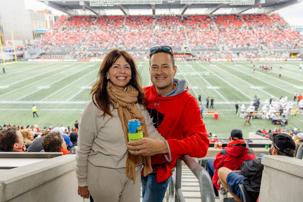 Guests smile for a photo at Panda Game