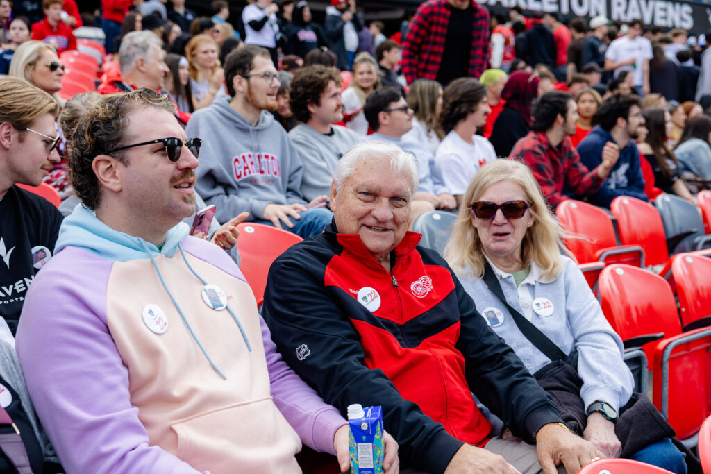 Guests smile for a photo at Panda Game