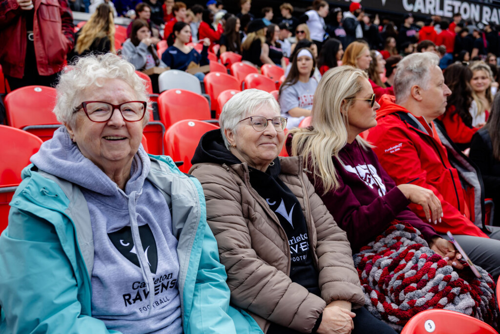 Guests smile for a photo at Panda Game