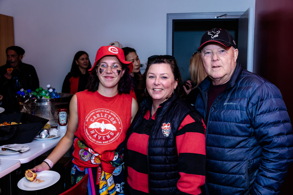 Guests smile for a photo at Panda Game