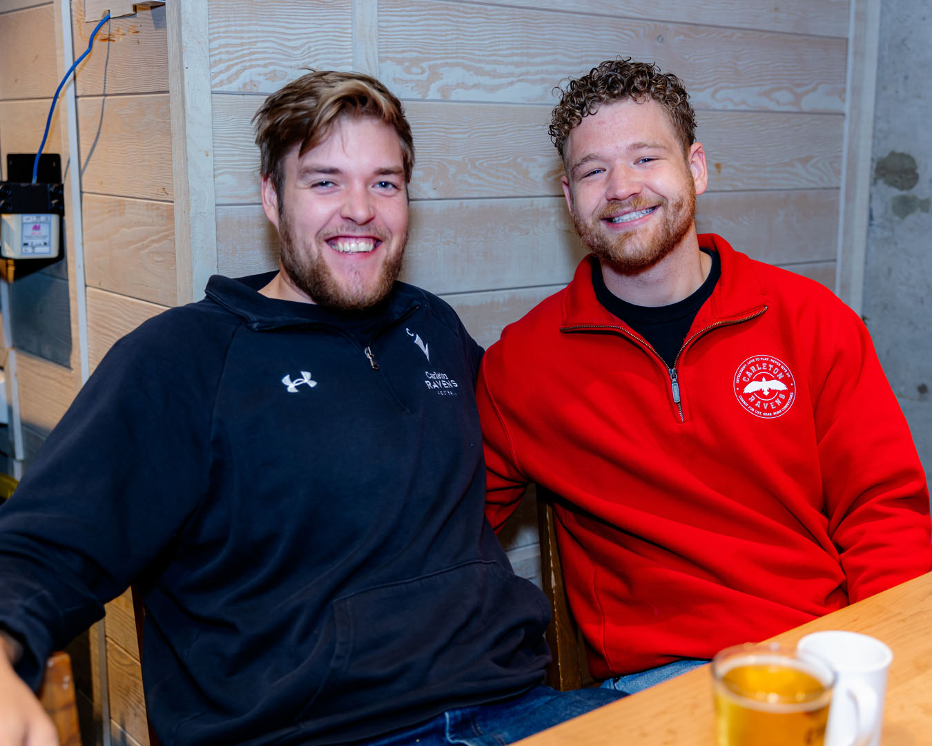 Two guests smile at the Pancaker Breakfast