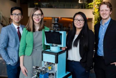 Engineering students with their capstone design project